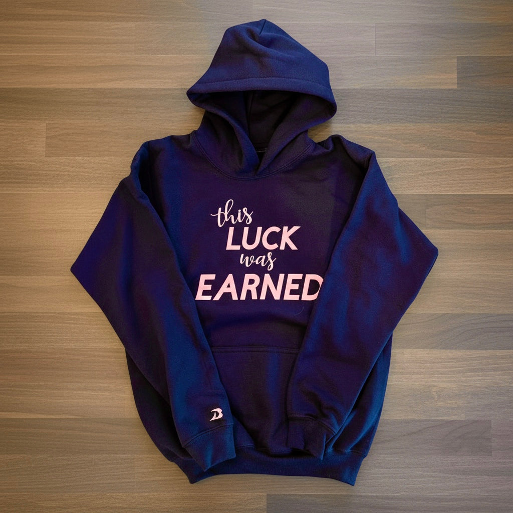 Black hoodie with 'this LUCK was Earned' text on a wooden surface best gymnastics wristbands for gymnasts
Holiday gifts for gymnasts