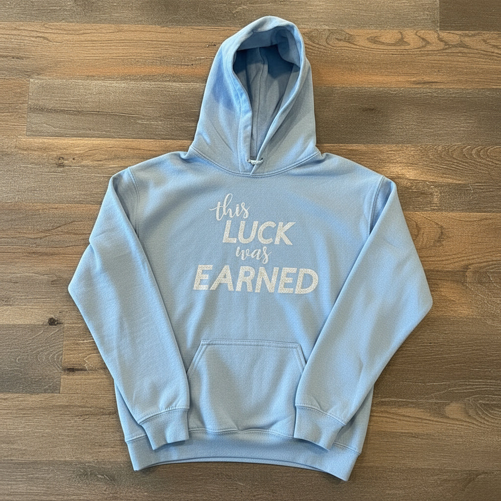 LIGHT BLUE hoodie with yellow text 'this LUCK was EarnED' on a white background best gymnastics wristbands for gymnasts
Holiday gifts for gymnasts