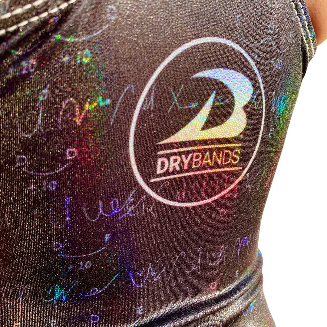 Back of DRYbands, Champion Routines leotard featuring Holotek fabric which reflects the light and gives off a rainbow hue.