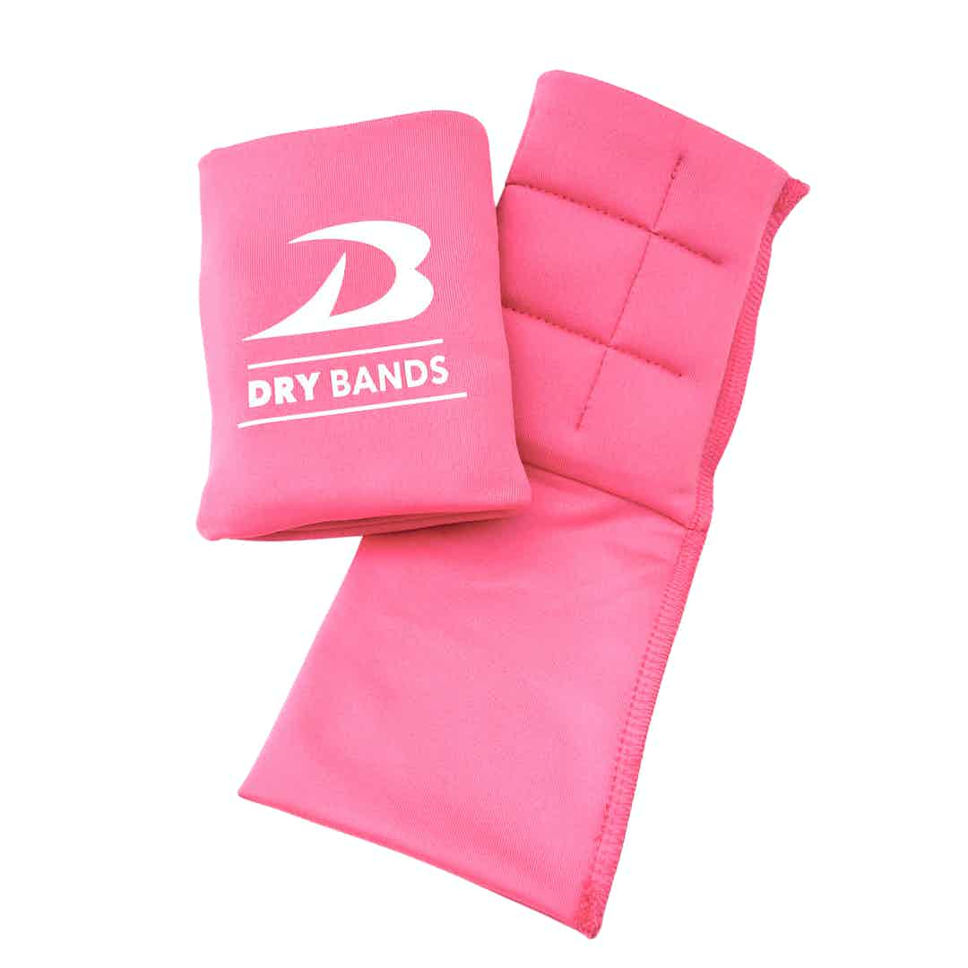 Wristband for use with grips.  Eliminates and reduces wrist rips and flips up over buckles or velcro for a safety, comfort and a sleek look.